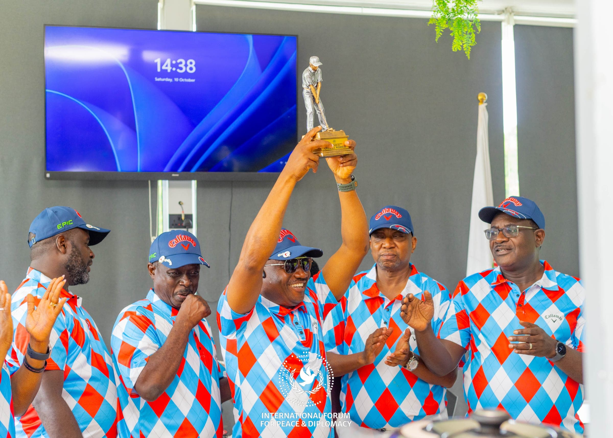 Members of The Diplomatic Golf celebrating with the Overall Winner trophy at Zuma Rock Resort, Abuja
